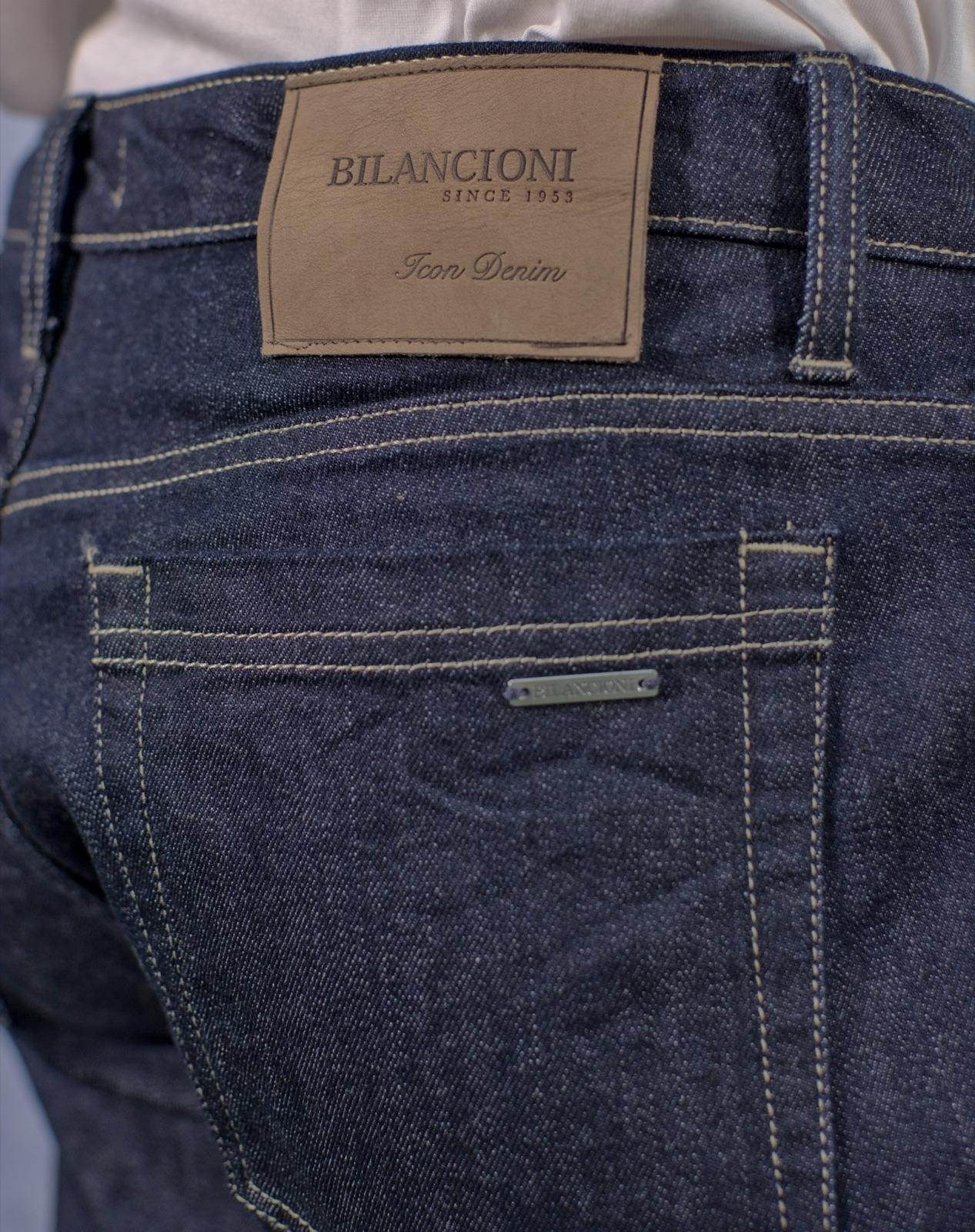 Leather Bilancioni patch and contrast topstitching on indigo denim